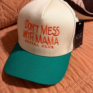 C.C Cream and Green Cap with Orange Text